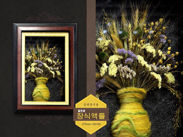 Dried flower decoration in frame